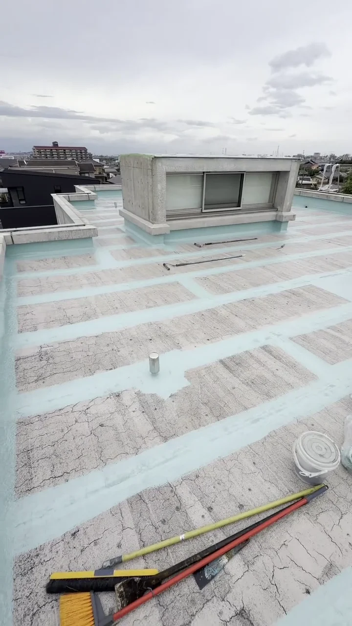View of multiple pale green coated joint strips across the roof